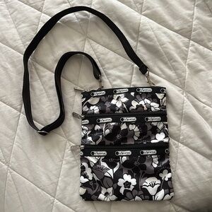 LeSportSac Madison Slim Three Zipper Crossbody Bag black and white floral tulip